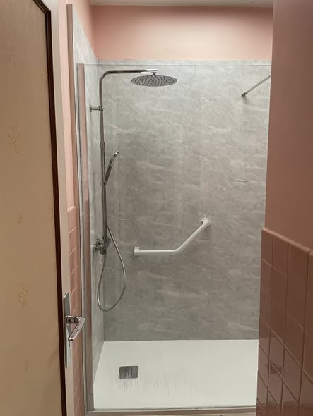 Installation d'une douche avec changement de radiateur